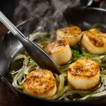 La cuisson parfaite des Saint-Jacques selon Bernard Loiseau (et une recette gourmande pour les sublimer)